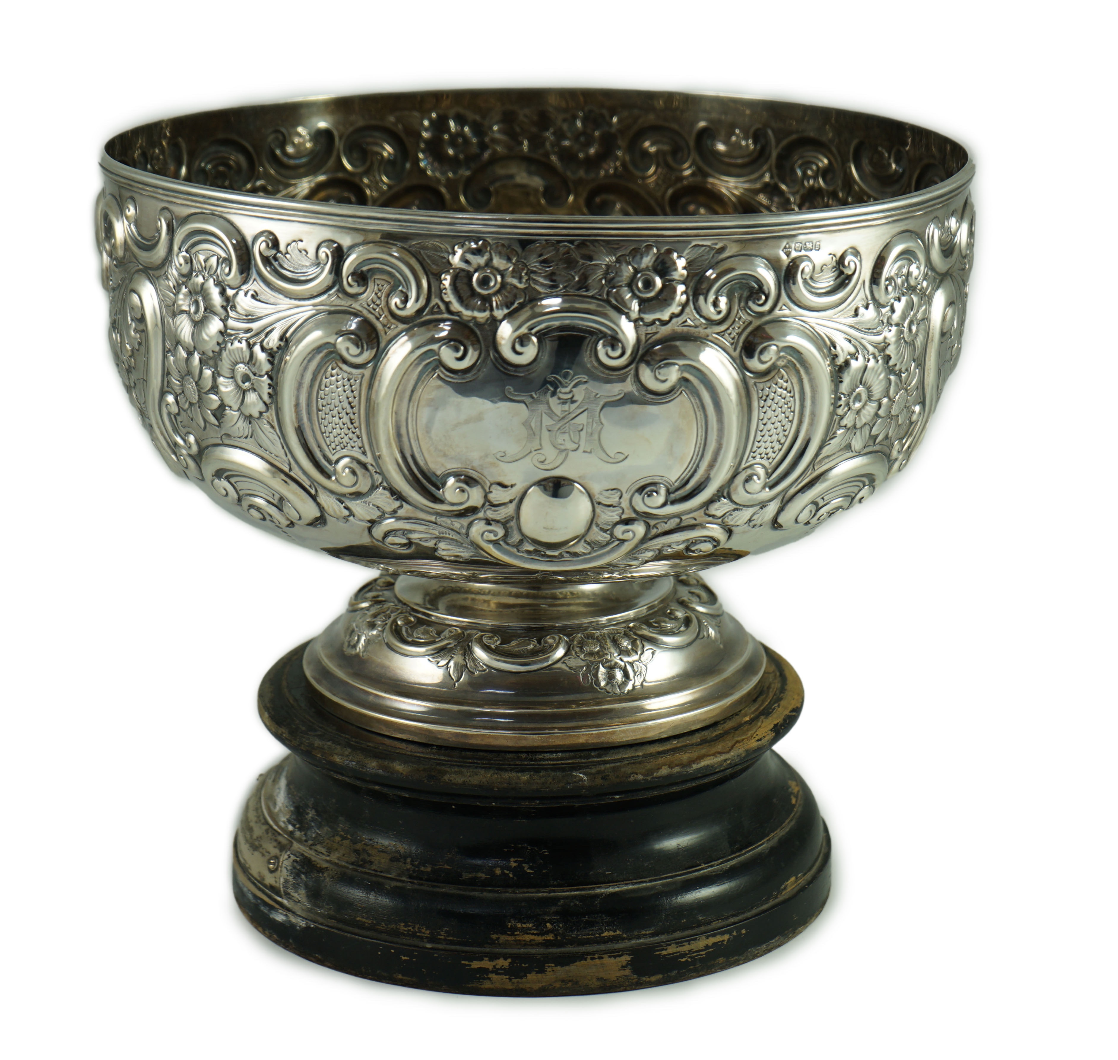 A late Victorian embossed silver pedestal punch bowl by Mappin Brothers (a.f.)